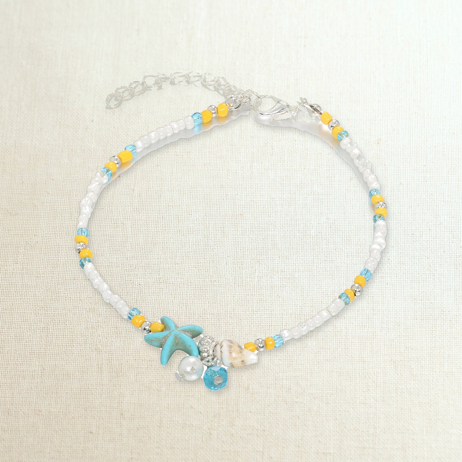 Cavigliera boho di perline con stella marina turchese, foto prodotto
