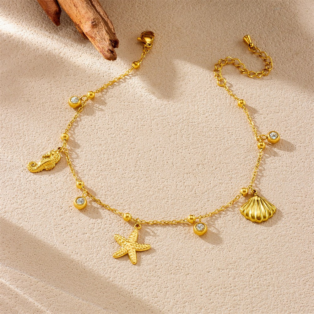 Cavigliera con charm marini in acciaio 316L, dettaglio